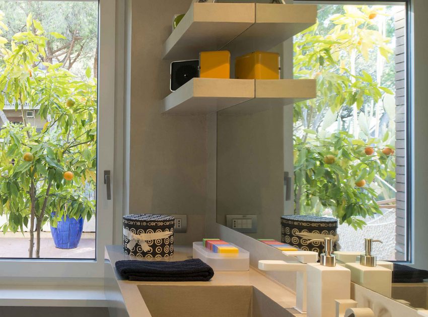 A Small and Colorful Modern Home with Vibrant Furniture and Art in Rome, Italy by Arabella Rocca (10)