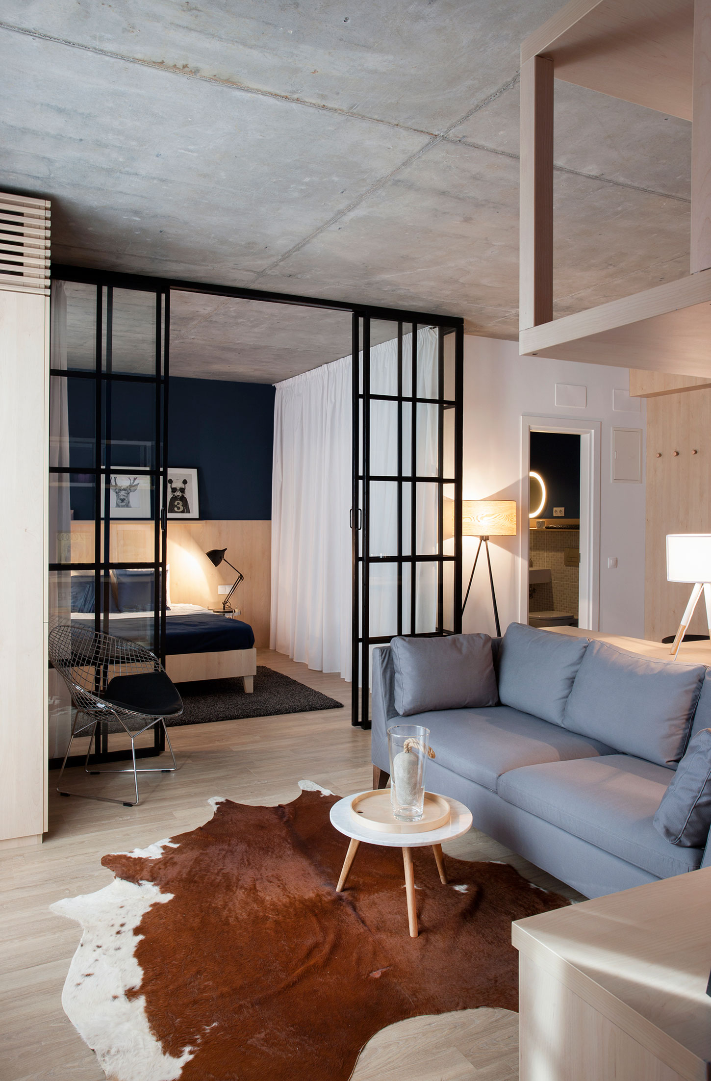 A Small and Modern Comfortable Apartment with a Dynamic Industrial Style in Bucharest by Bogdan Ciocodeică & Diana Roşu (2)