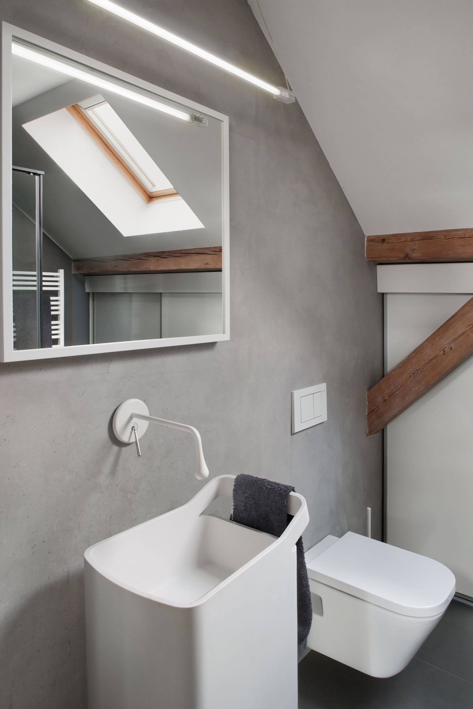 A Spacious Apartment with Beauty of Brick Walls and Timber Structure in Poznań, Poland by Cuns Studio (12)