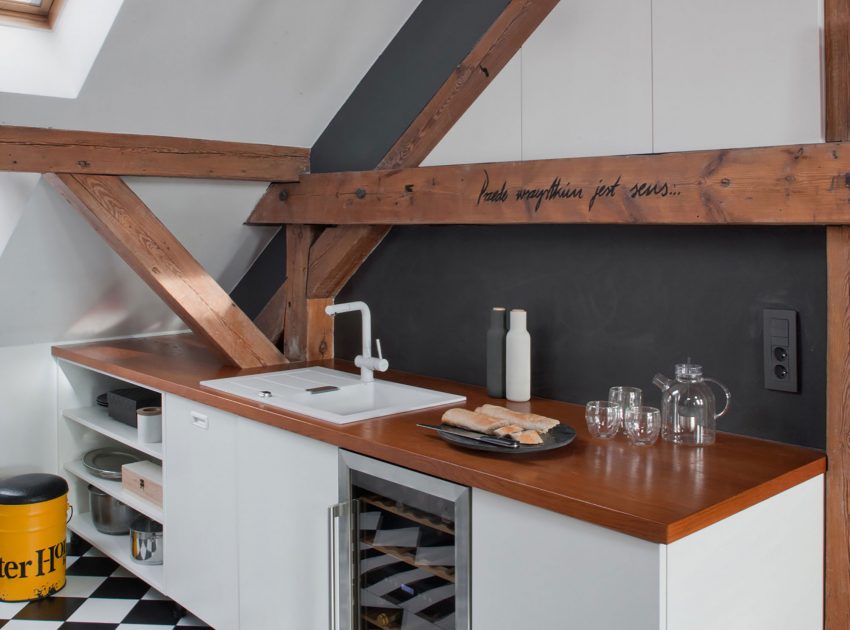 A Spacious Apartment with Beauty of Brick Walls and Timber Structure in Poznań, Poland by Cuns Studio (8)