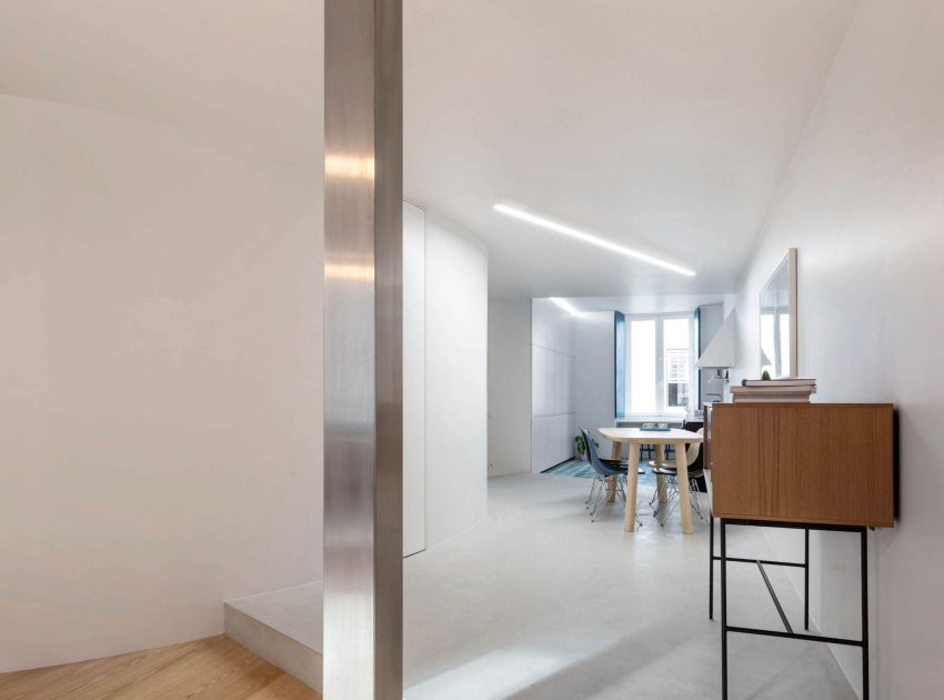 A Spacious Contemporary Apartment Framed by a Semi-Circular Wall in Lisbon by Fala Atelier (10)