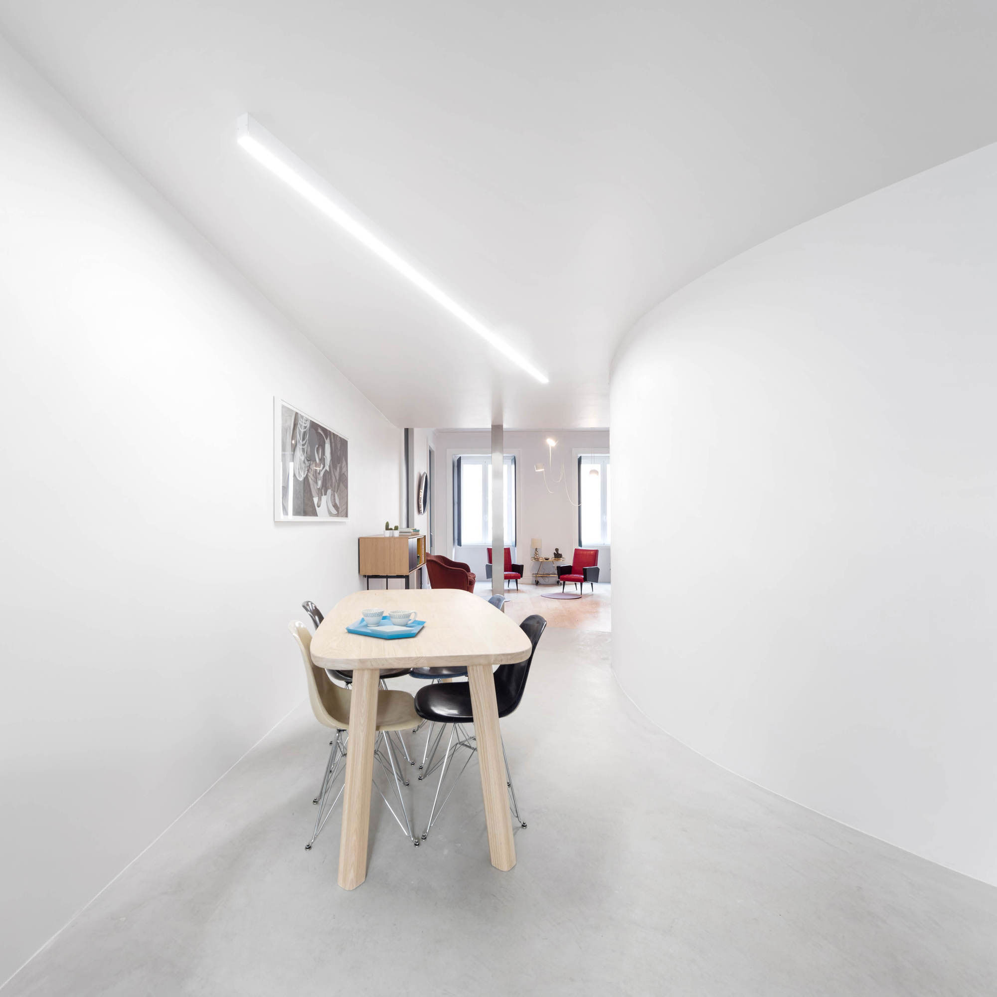 A Spacious Contemporary Apartment Framed by a Semi-Circular Wall in Lisbon by Fala Atelier (18)