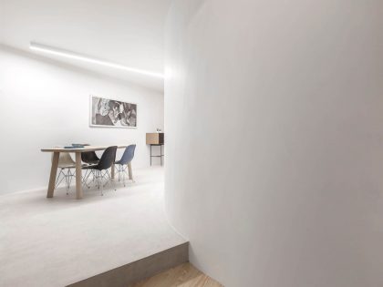 A Spacious Contemporary Apartment Framed by a Semi-Circular Wall in Lisbon by Fala Atelier (19)