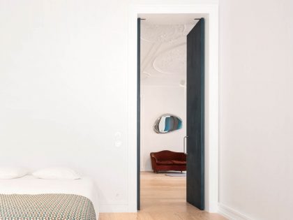 A Spacious Contemporary Apartment Framed by a Semi-Circular Wall in Lisbon by Fala Atelier (21)