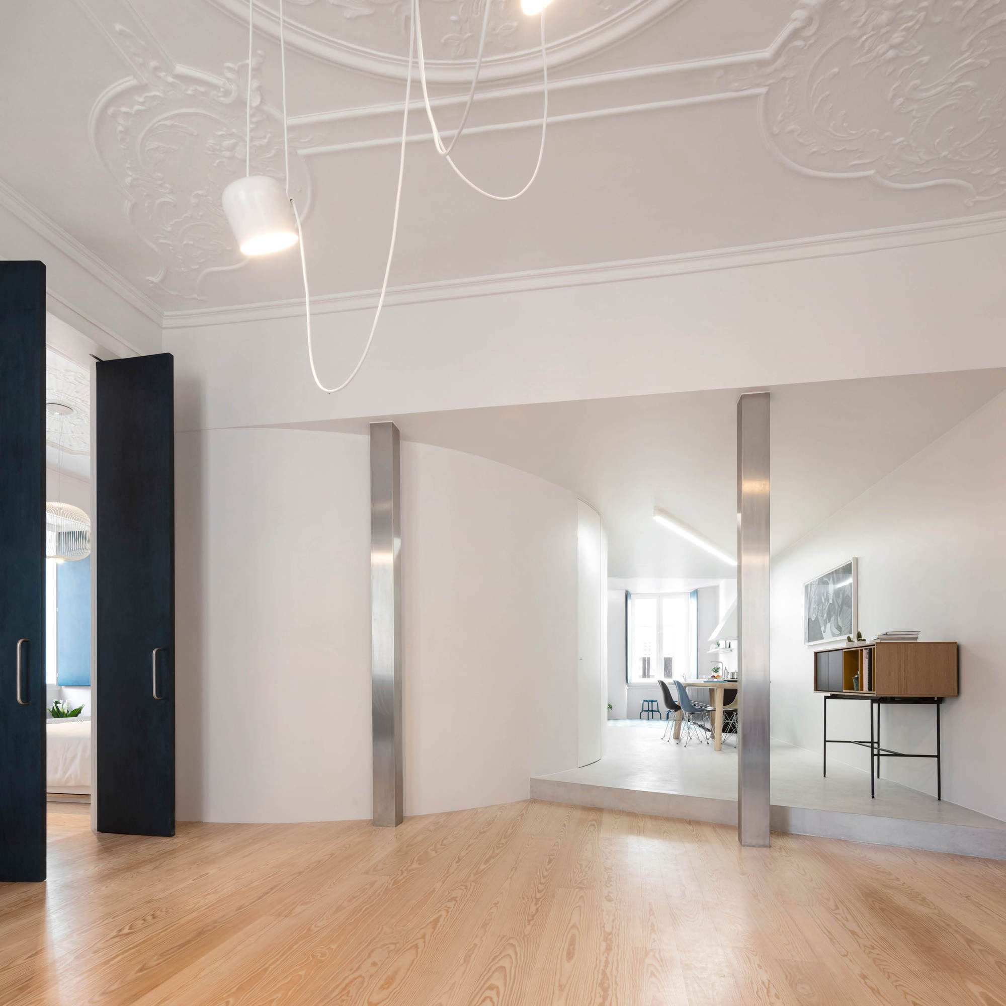 A Spacious Contemporary Apartment Framed by a Semi-Circular Wall in Lisbon by Fala Atelier (6)