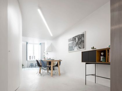 A Spacious Contemporary Apartment Framed by a Semi-Circular Wall in Lisbon by Fala Atelier (7)