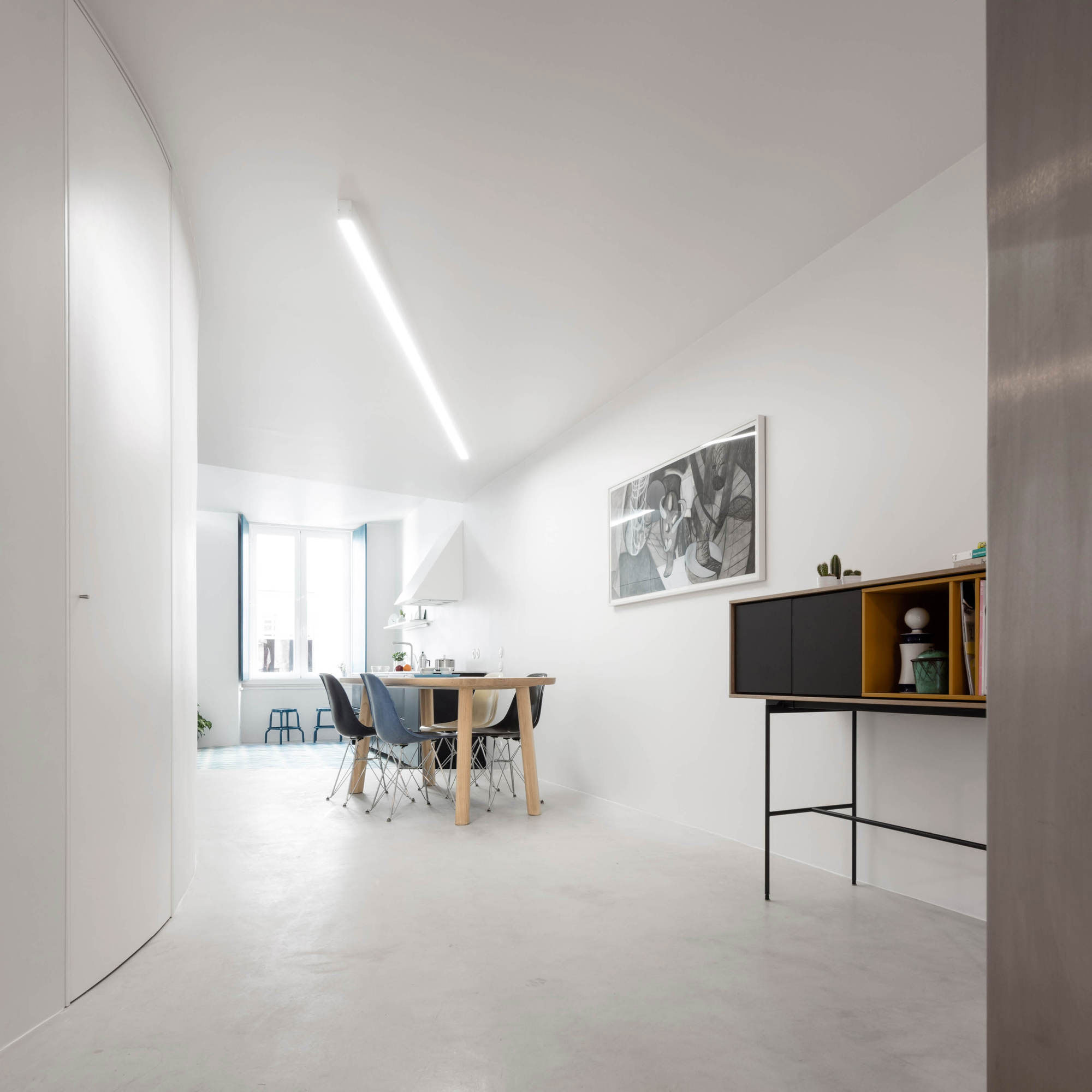 A Spacious Contemporary Apartment Framed by a Semi-Circular Wall in Lisbon by Fala Atelier (7)