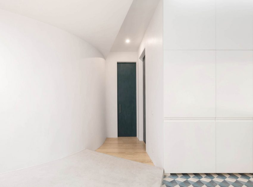 A Spacious Contemporary Apartment Framed by a Semi-Circular Wall in Lisbon by Fala Atelier (8)