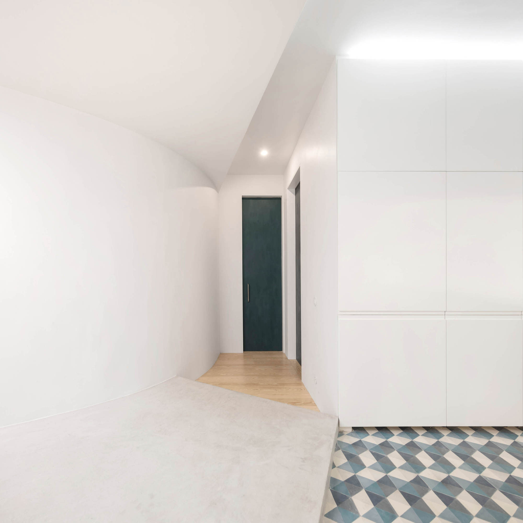 A Spacious Contemporary Apartment Framed by a Semi-Circular Wall in Lisbon by Fala Atelier (8)