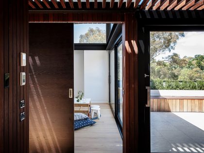 A Spacious Contemporary Home of Stone and Steel Built Above a River in Melbourne, Australia by Alexandra Buchanan Architecture (18)