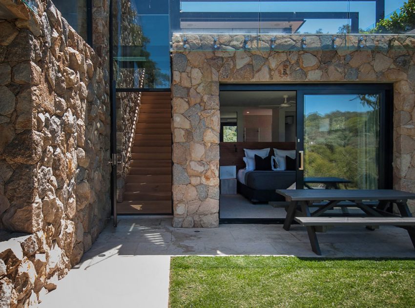 A Spacious Contemporary Home of Stone and Steel Built Above a River in Melbourne, Australia by Alexandra Buchanan Architecture (2)