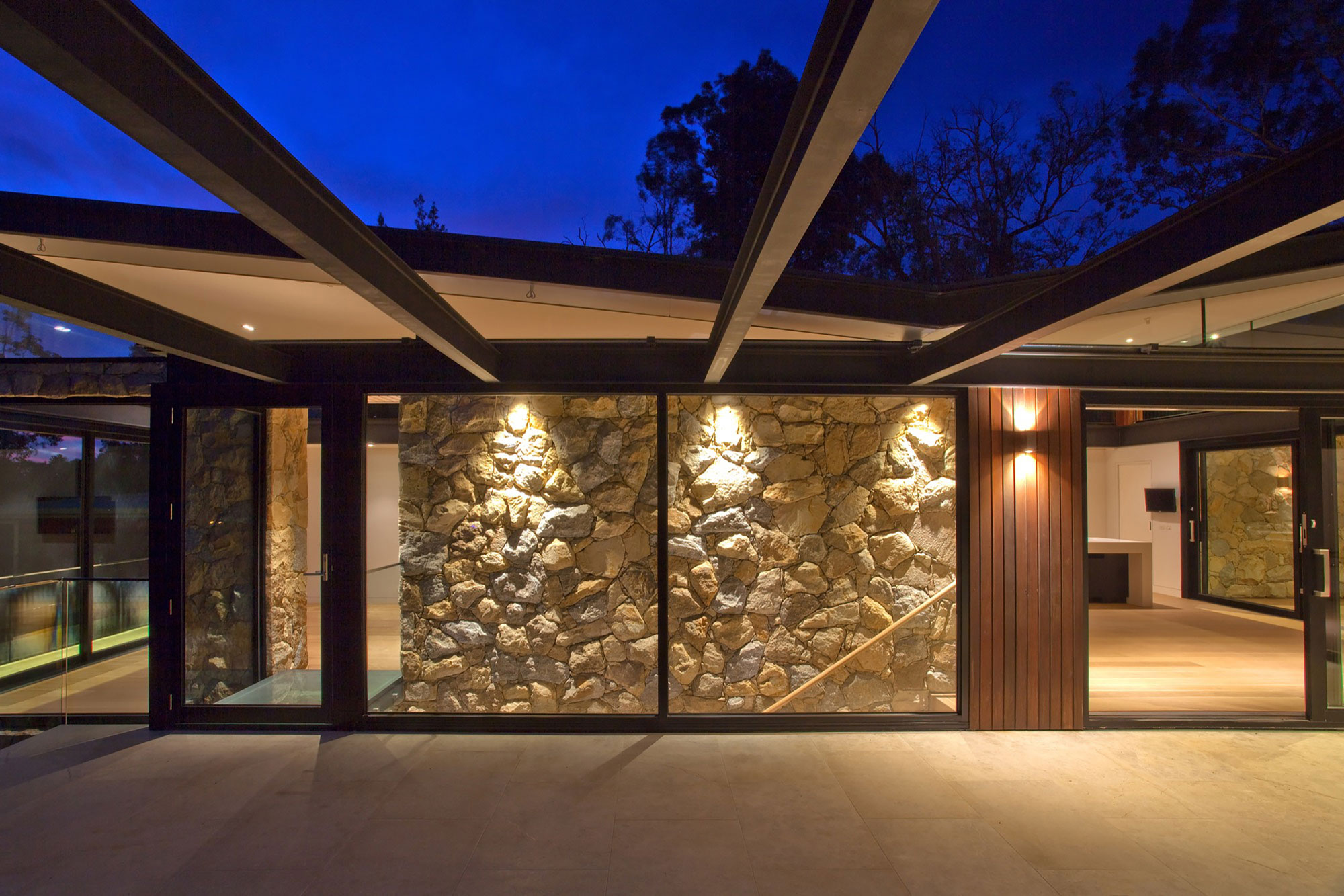 A Spacious Contemporary Home of Stone and Steel Built Above a River in Melbourne, Australia by Alexandra Buchanan Architecture (21)