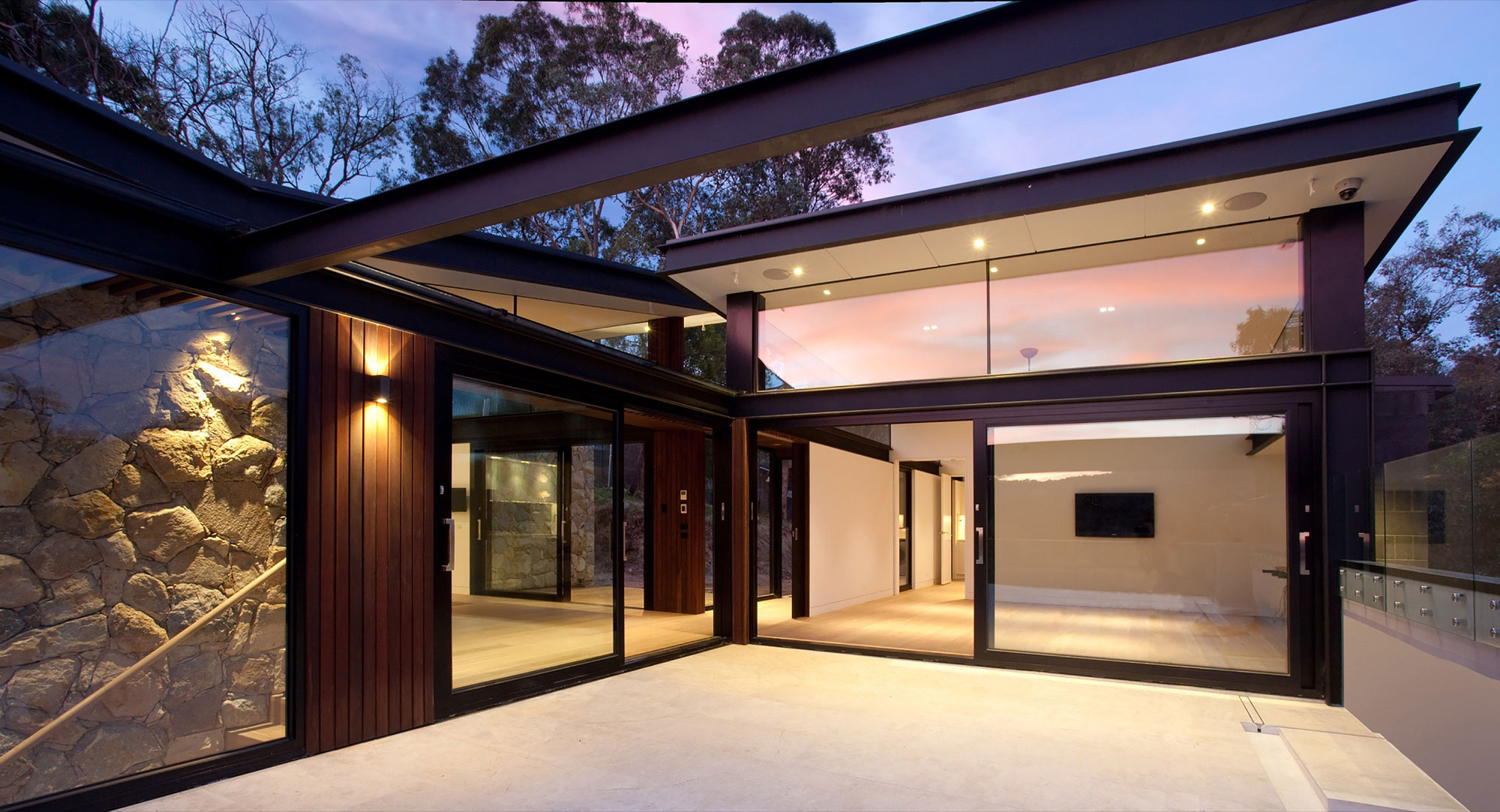 A Spacious Contemporary Home of Stone and Steel Built Above a River in Melbourne, Australia by Alexandra Buchanan Architecture (22)