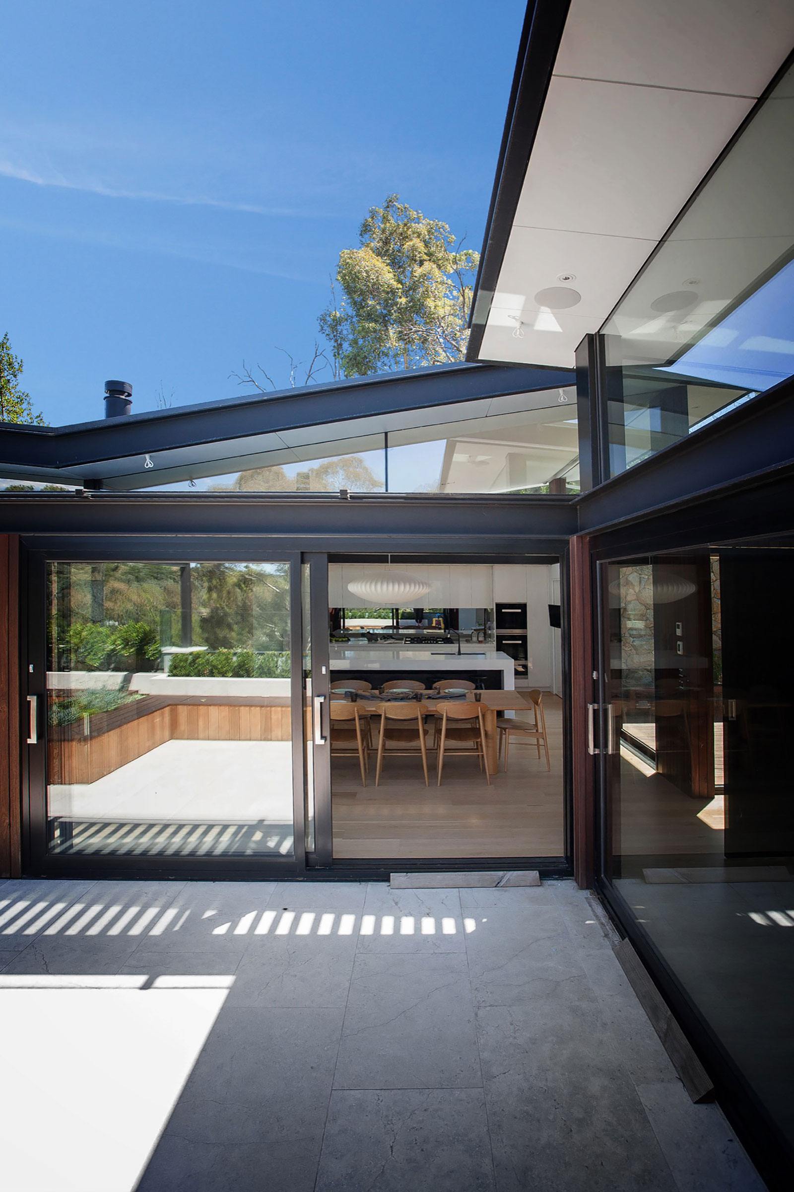 A Spacious Contemporary Home of Stone and Steel Built Above a River in Melbourne, Australia by Alexandra Buchanan Architecture (3)
