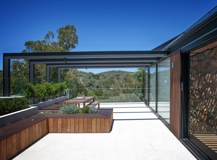 A Spacious Contemporary Home of Stone and Steel Built Above a River in Melbourne, Australia by Alexandra Buchanan Architecture (4)