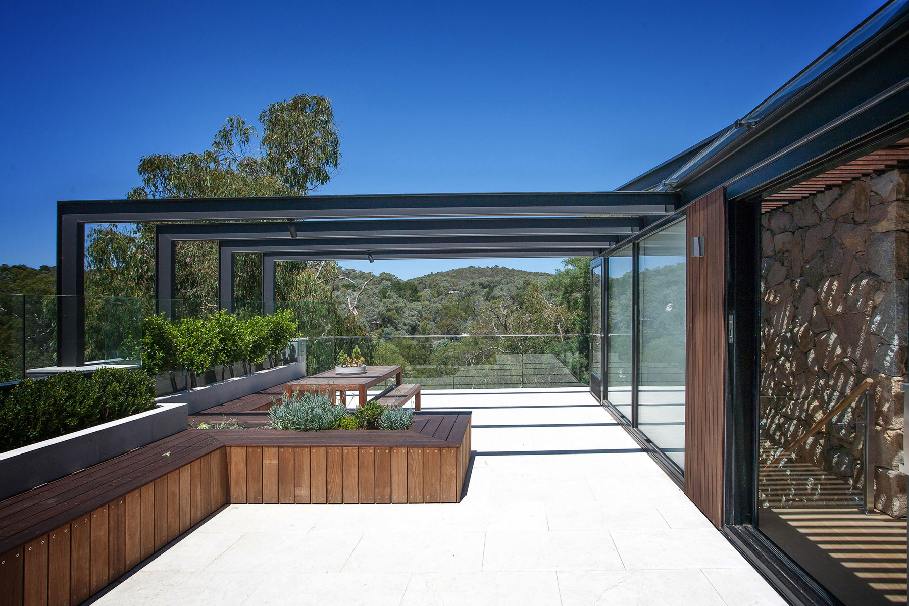 A Spacious Contemporary Home of Stone and Steel Built Above a River in Melbourne, Australia by Alexandra Buchanan Architecture (4)