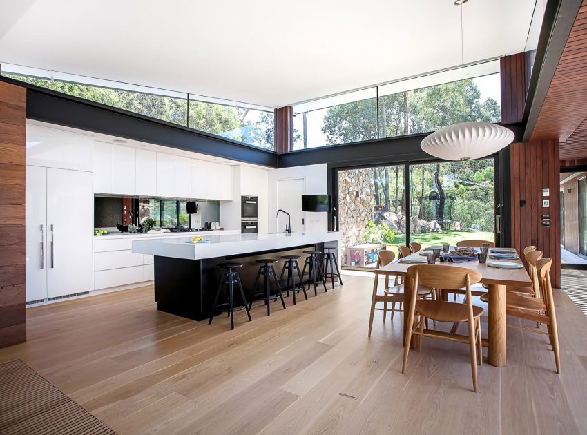 A Spacious Contemporary Home of Stone and Steel Built Above a River in Melbourne, Australia by Alexandra Buchanan Architecture (9)