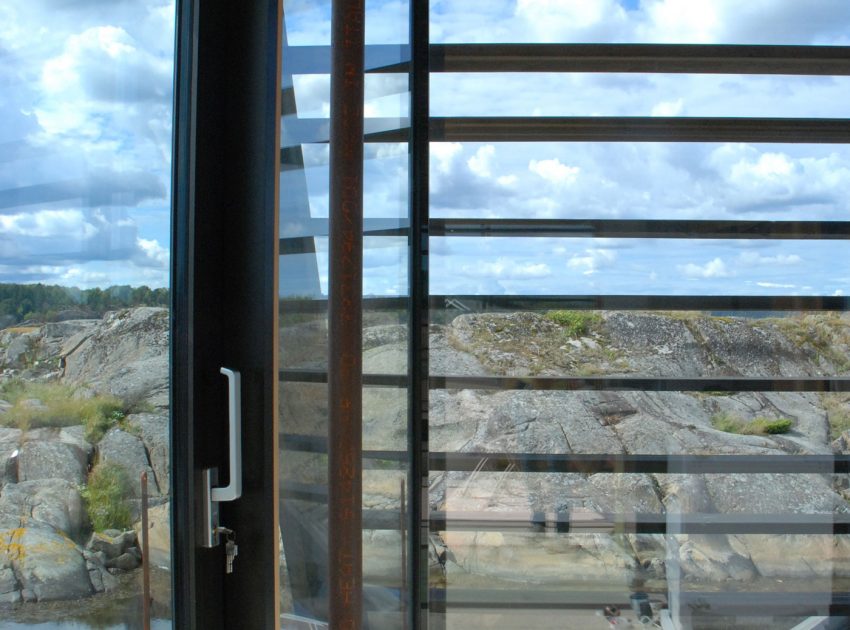 A Stunning Glass-Walled House Surrounded by the Rocky Landscape of Larvik, Norway by Lund Hagem (12)