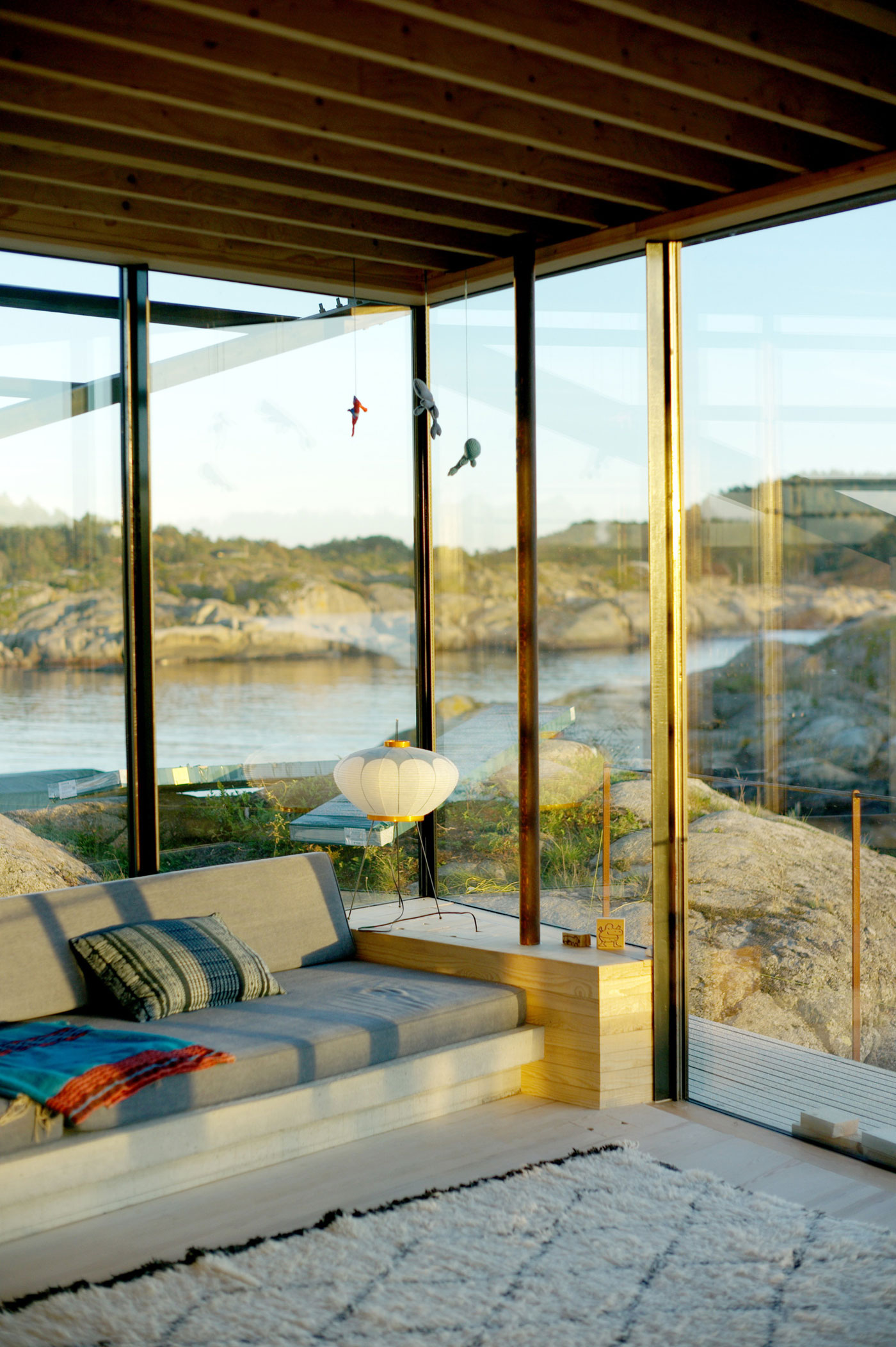 A Stunning Glass-Walled House Surrounded by the Rocky Landscape of Larvik, Norway by Lund Hagem (13)