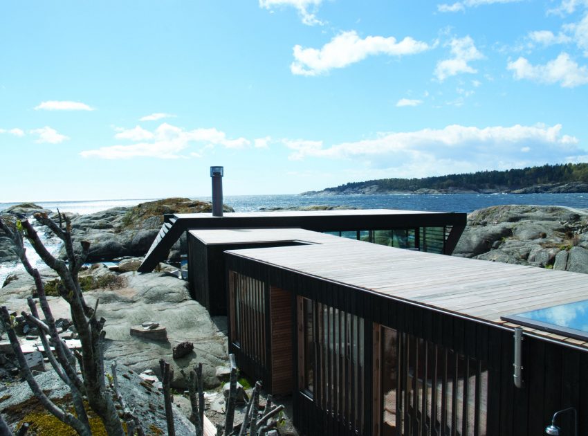 A Stunning Glass-Walled House Surrounded by the Rocky Landscape of Larvik, Norway by Lund Hagem (4)