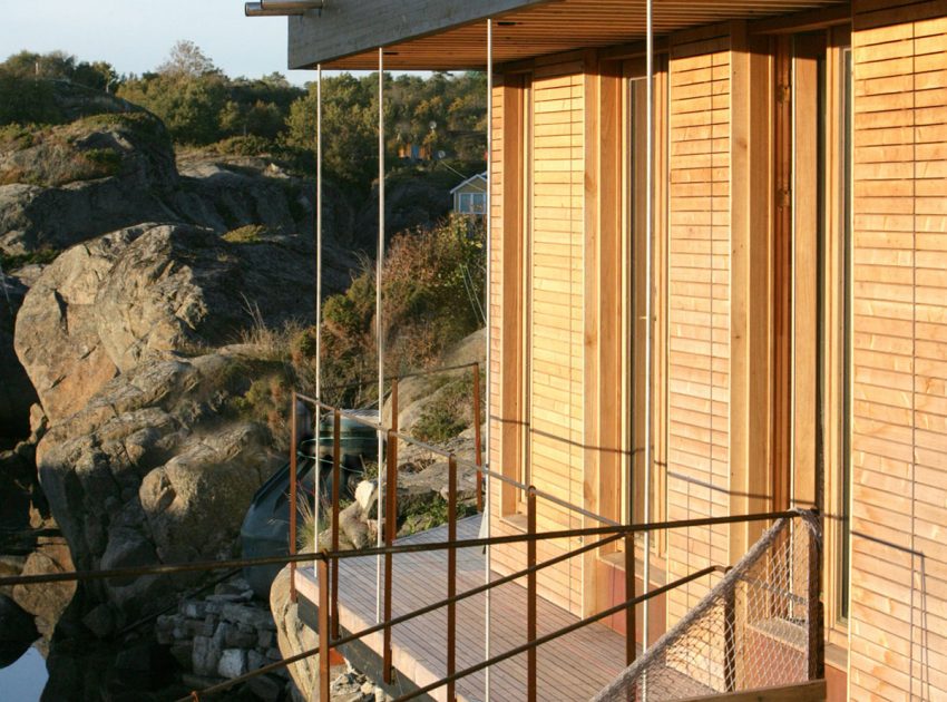 A Stunning Glass-Walled House Surrounded by the Rocky Landscape of Larvik, Norway by Lund Hagem (7)