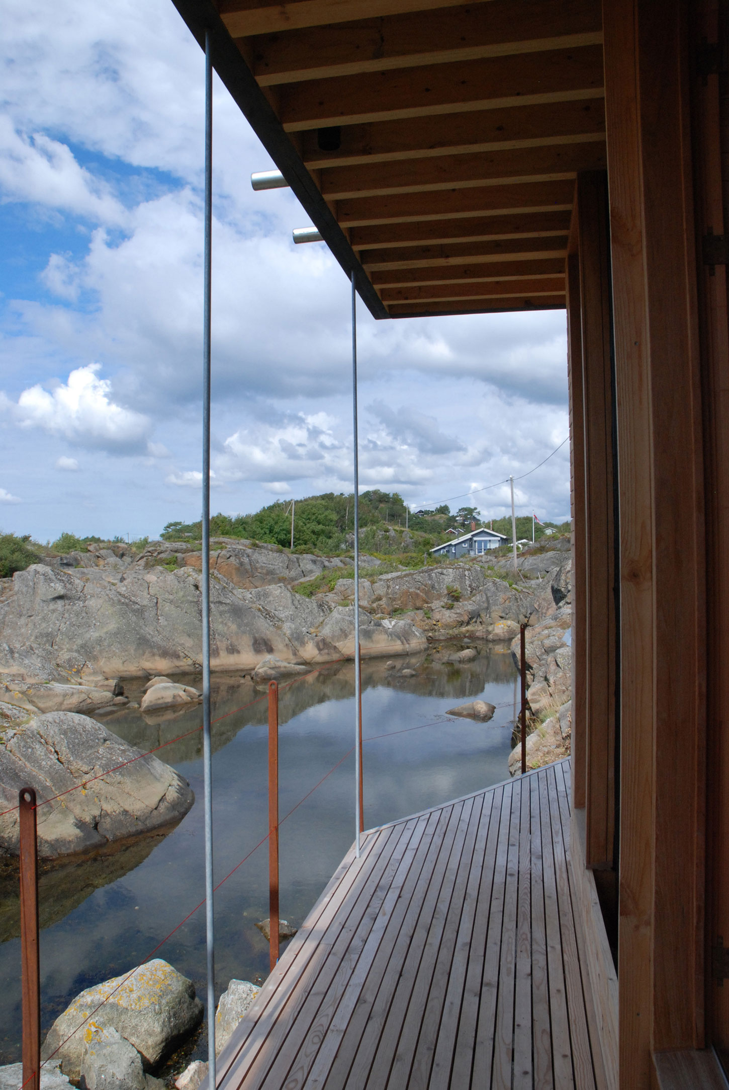 A Stunning Glass-Walled House Surrounded by the Rocky Landscape of Larvik, Norway by Lund Hagem (8)