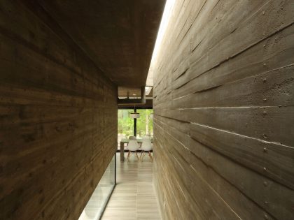 A Stunning Summer House with Concrete Pergola in the Woodland of Pinamar, Argentina by Besonias Almeida Arquitectos (12)