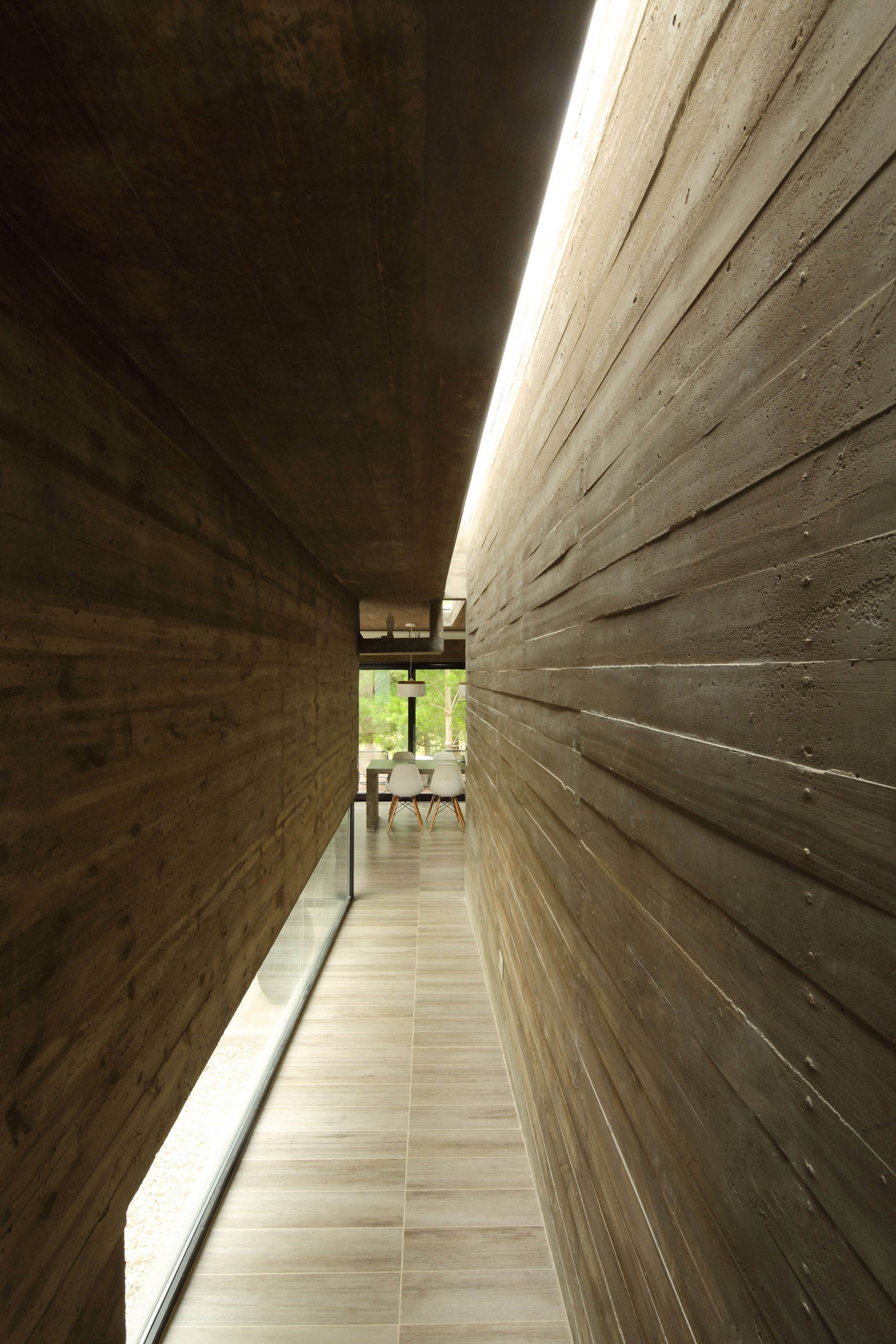 A Stunning Summer House with Concrete Pergola in the Woodland of Pinamar, Argentina by Besonias Almeida Arquitectos (12)