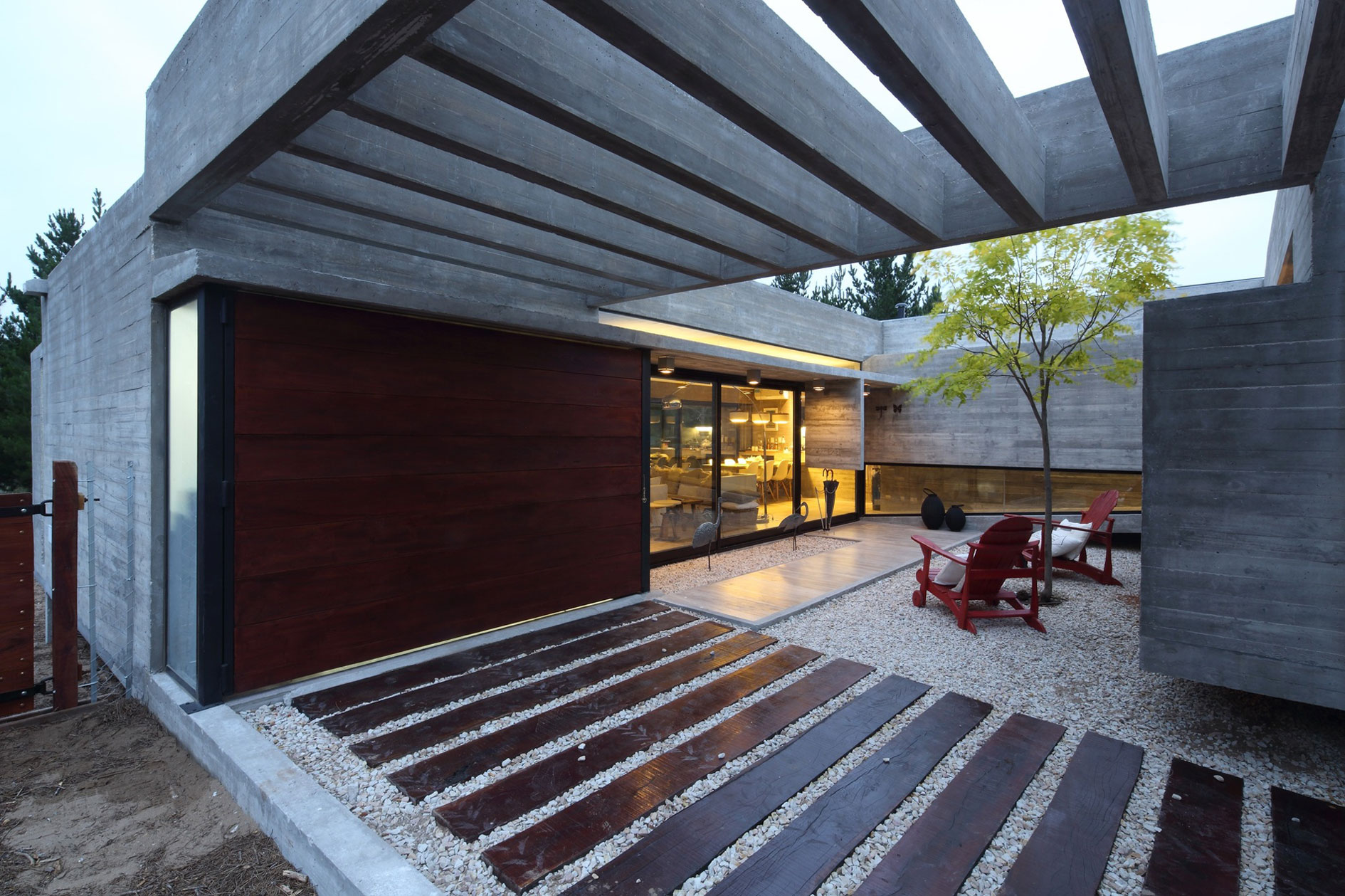 A Stunning Summer House with Concrete Pergola in the Woodland of Pinamar, Argentina by Besonias Almeida Arquitectos (13)