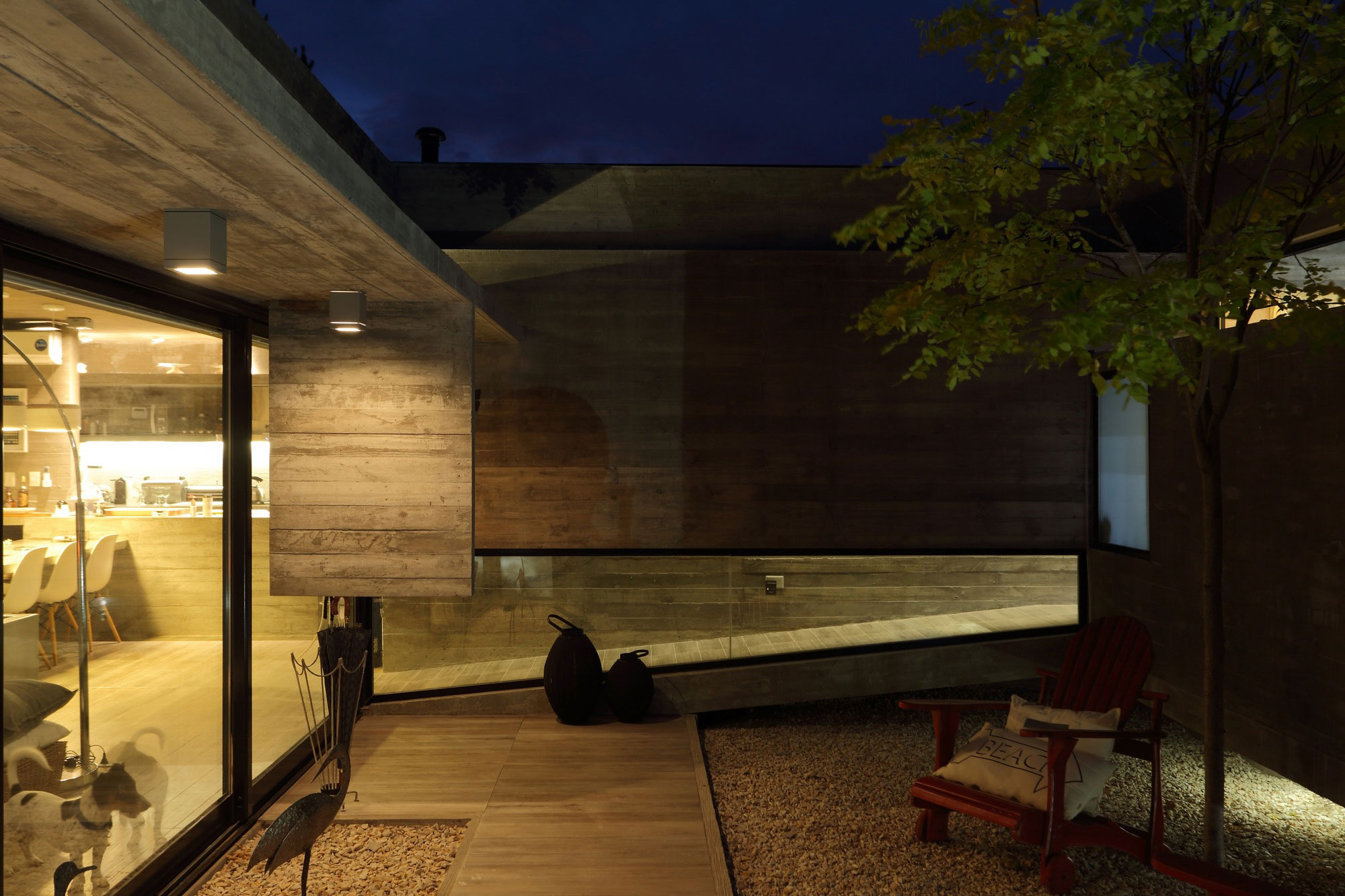 A Stunning Summer House with Concrete Pergola in the Woodland of Pinamar, Argentina by Besonias Almeida Arquitectos (14)