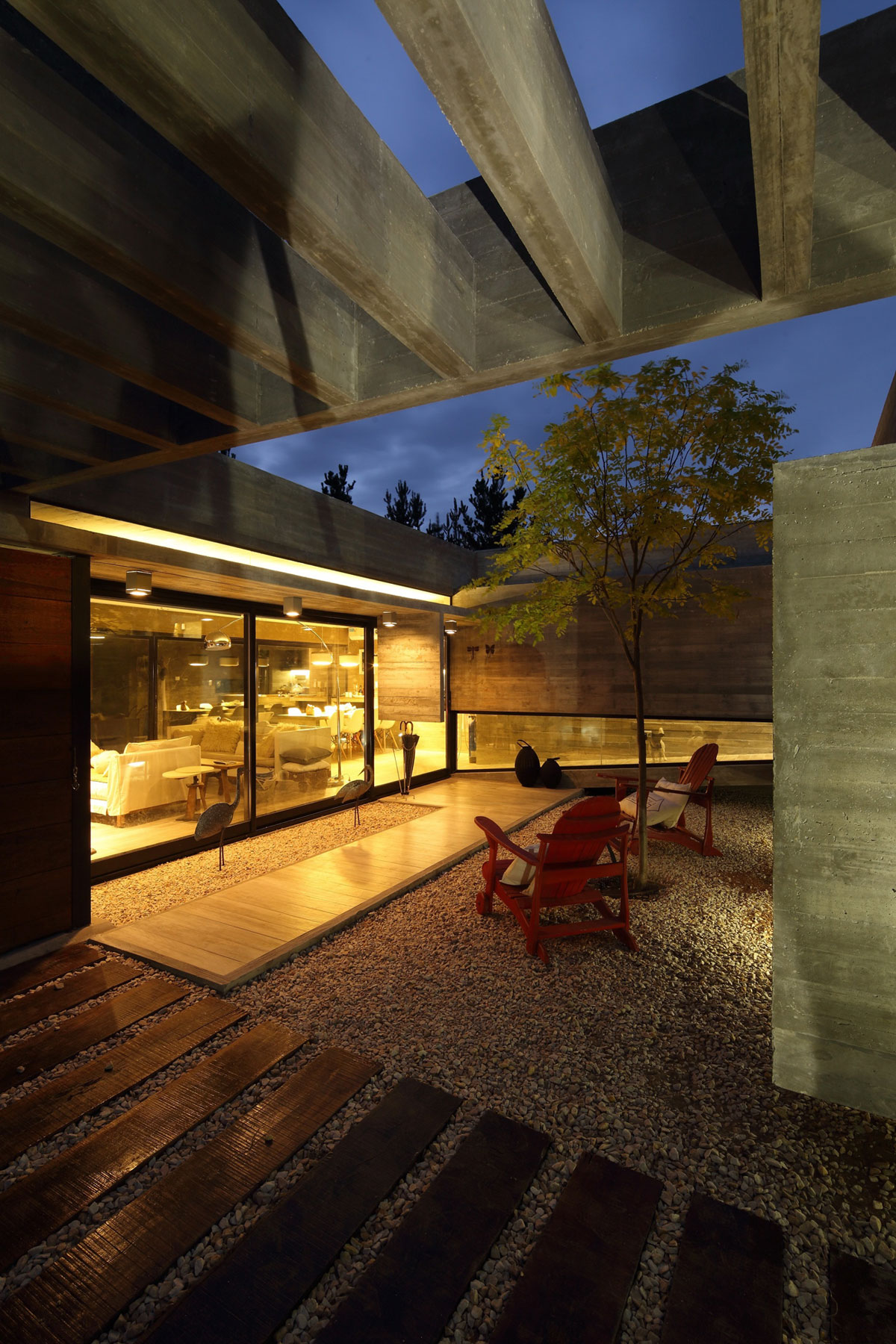 A Stunning Summer House with Concrete Pergola in the Woodland of Pinamar, Argentina by Besonias Almeida Arquitectos (15)