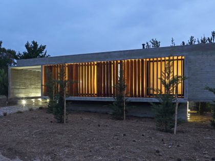 A Stunning Summer House with Concrete Pergola in the Woodland of Pinamar, Argentina by Besonias Almeida Arquitectos (16)