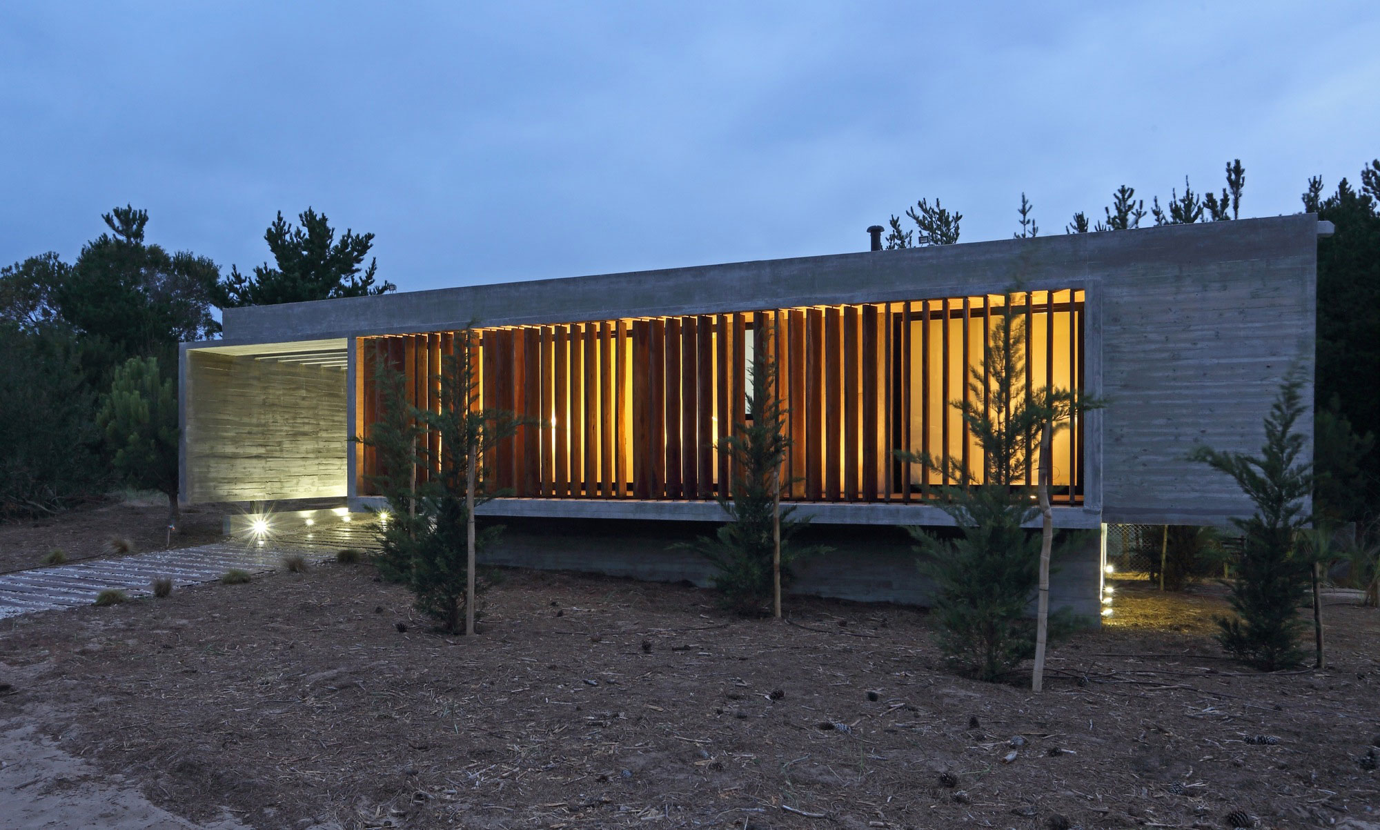 A Stunning Summer House with Concrete Pergola in the Woodland of Pinamar, Argentina by Besonias Almeida Arquitectos (16)