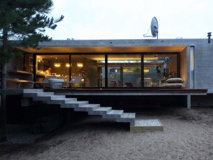 A Stunning Summer House with Concrete Pergola in the Woodland of Pinamar, Argentina by Besonias Almeida Arquitectos (17)