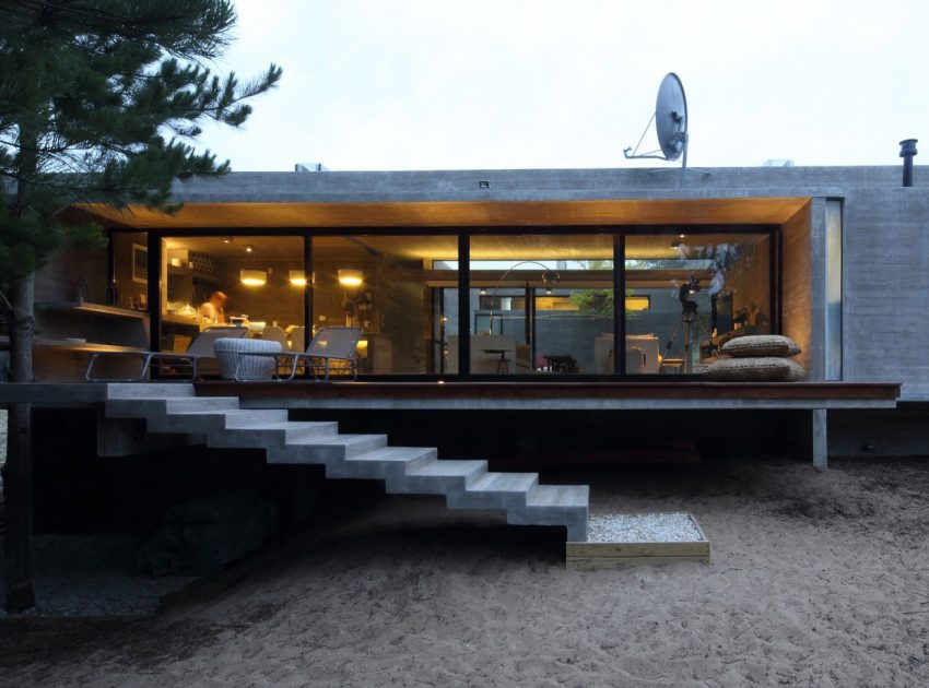 A Stunning Summer House with Concrete Pergola in the Woodland of Pinamar, Argentina by Besonias Almeida Arquitectos (17)