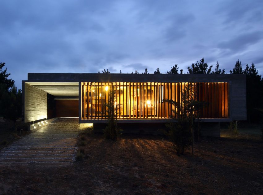 A Stunning Summer House with Concrete Pergola in the Woodland of Pinamar, Argentina by Besonias Almeida Arquitectos (18)