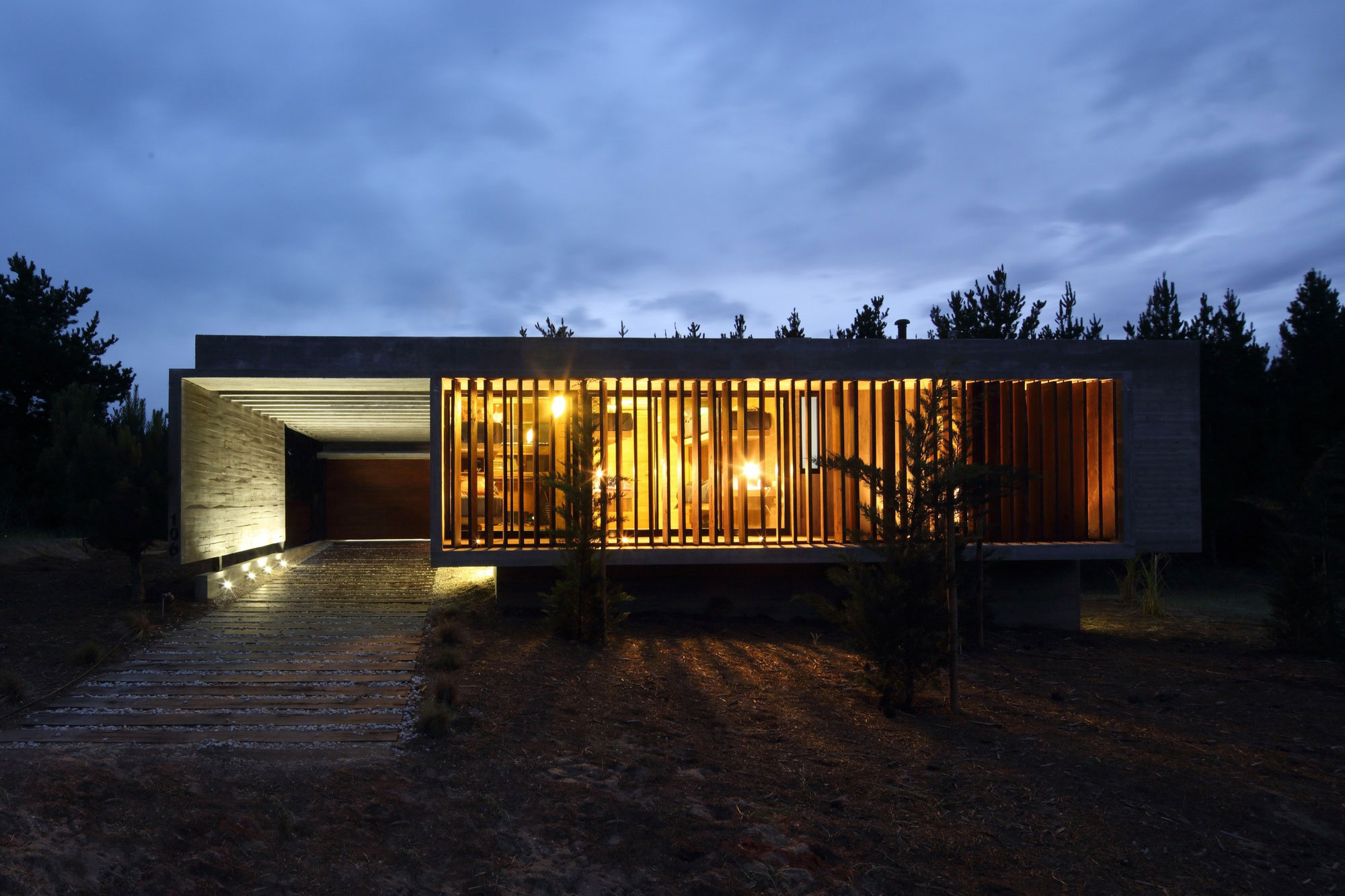 A Stunning Summer House with Concrete Pergola in the Woodland of Pinamar, Argentina by Besonias Almeida Arquitectos (18)