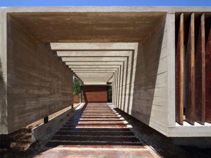 A Stunning Summer House with Concrete Pergola in the Woodland of Pinamar, Argentina by Besonias Almeida Arquitectos (3)