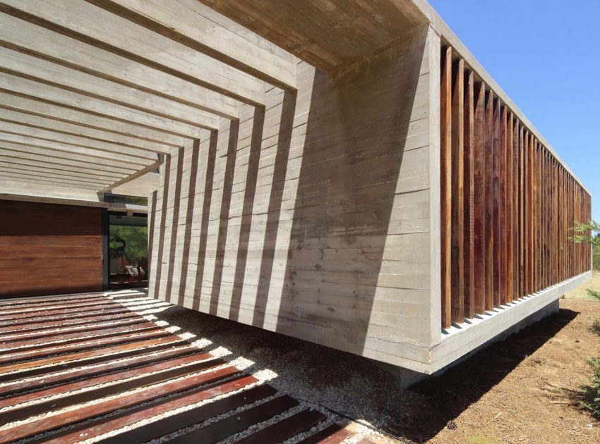 A Stunning Summer House with Concrete Pergola in the Woodland of Pinamar, Argentina by Besonias Almeida Arquitectos (5)