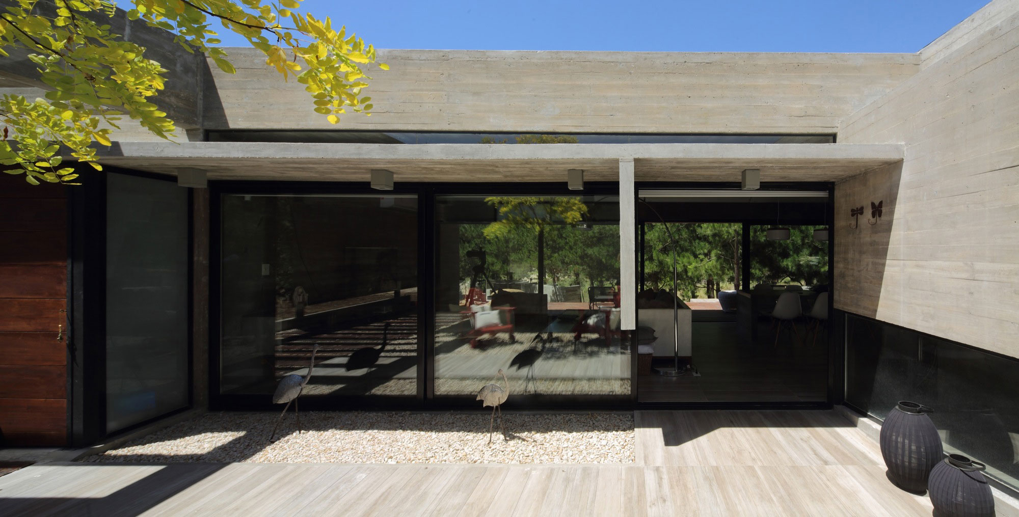 A Stunning Summer House with Concrete Pergola in the Woodland of Pinamar, Argentina by Besonias Almeida Arquitectos (8)