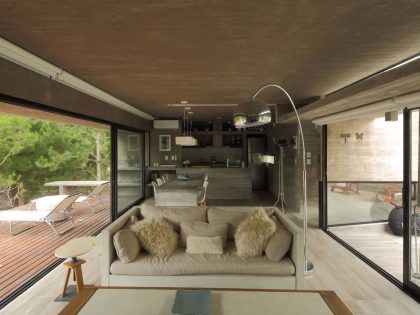 A Stunning Summer House with Concrete Pergola in the Woodland of Pinamar, Argentina by Besonias Almeida Arquitectos (9)