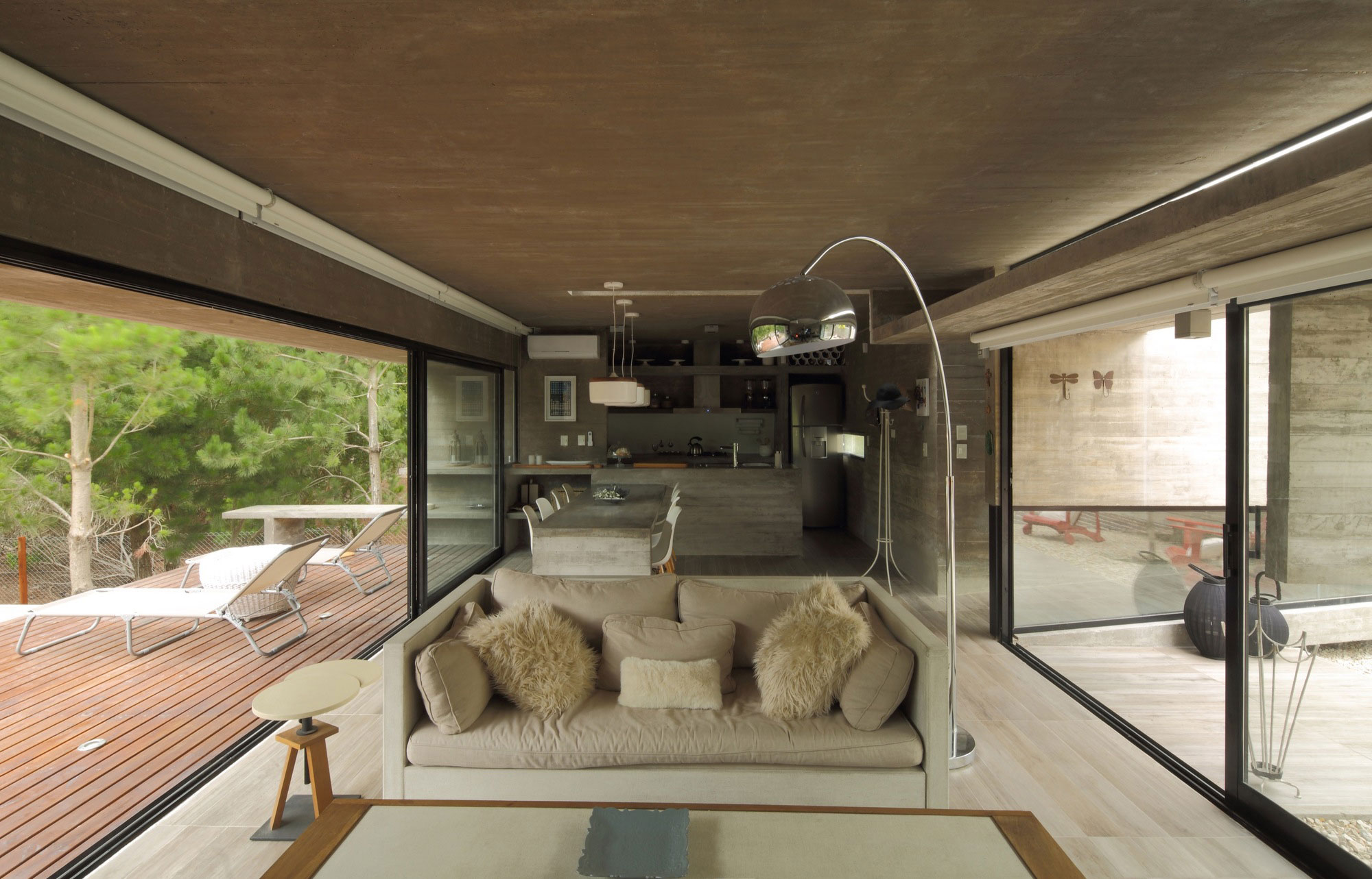 A Stunning Summer House with Concrete Pergola in the Woodland of Pinamar, Argentina by Besonias Almeida Arquitectos (9)