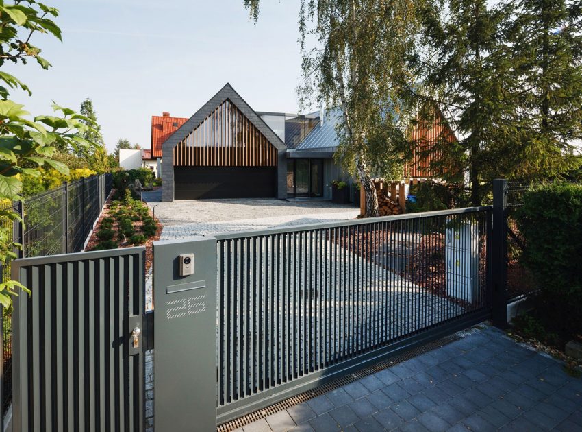 A Stunning and Spacious Two Barns House for a Modern Family in Tychy, Poland by RS + Robert Skitek (1)