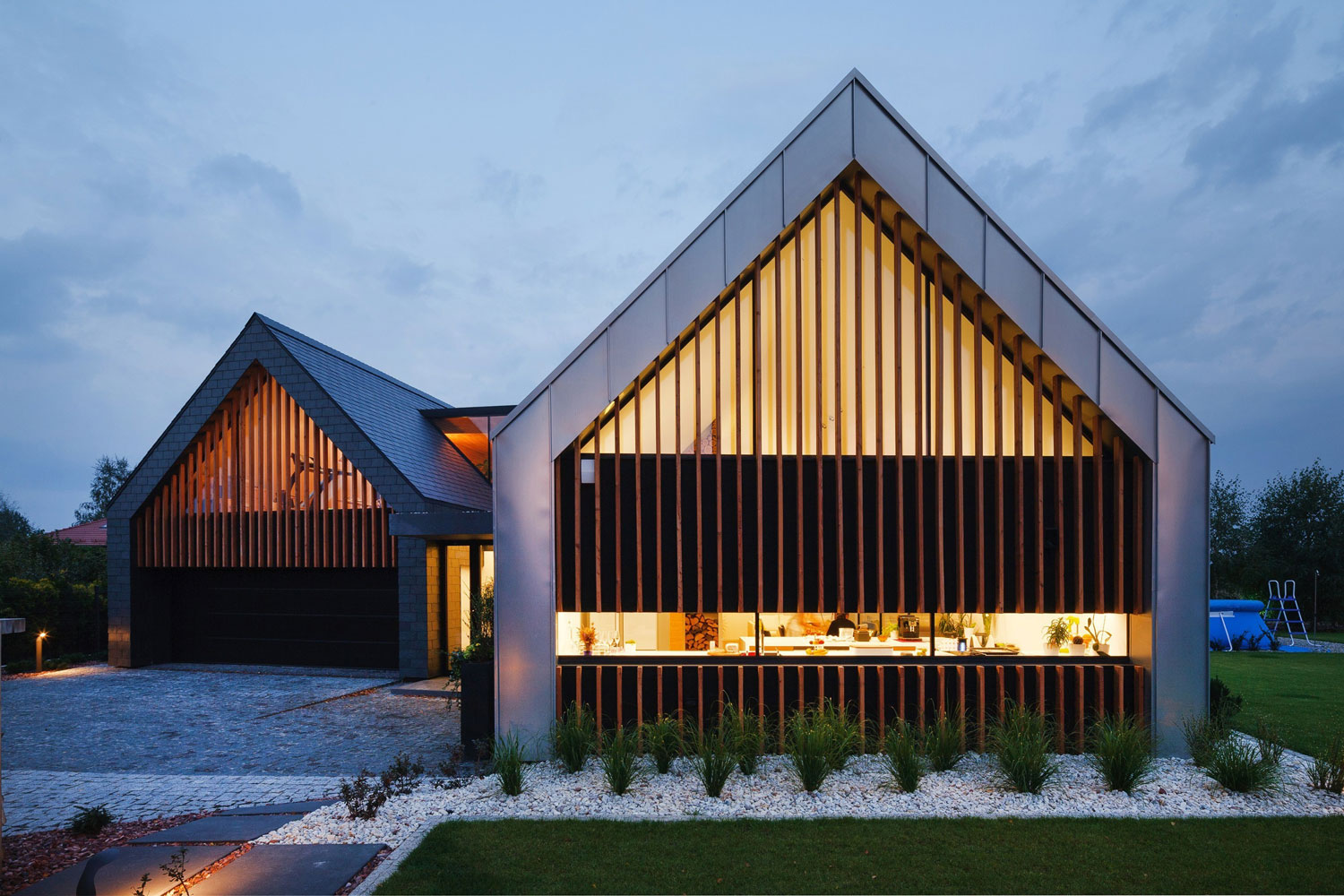 A Stunning and Spacious Two Barns House for a Modern Family in Tychy, Poland by RS + Robert Skitek (18)