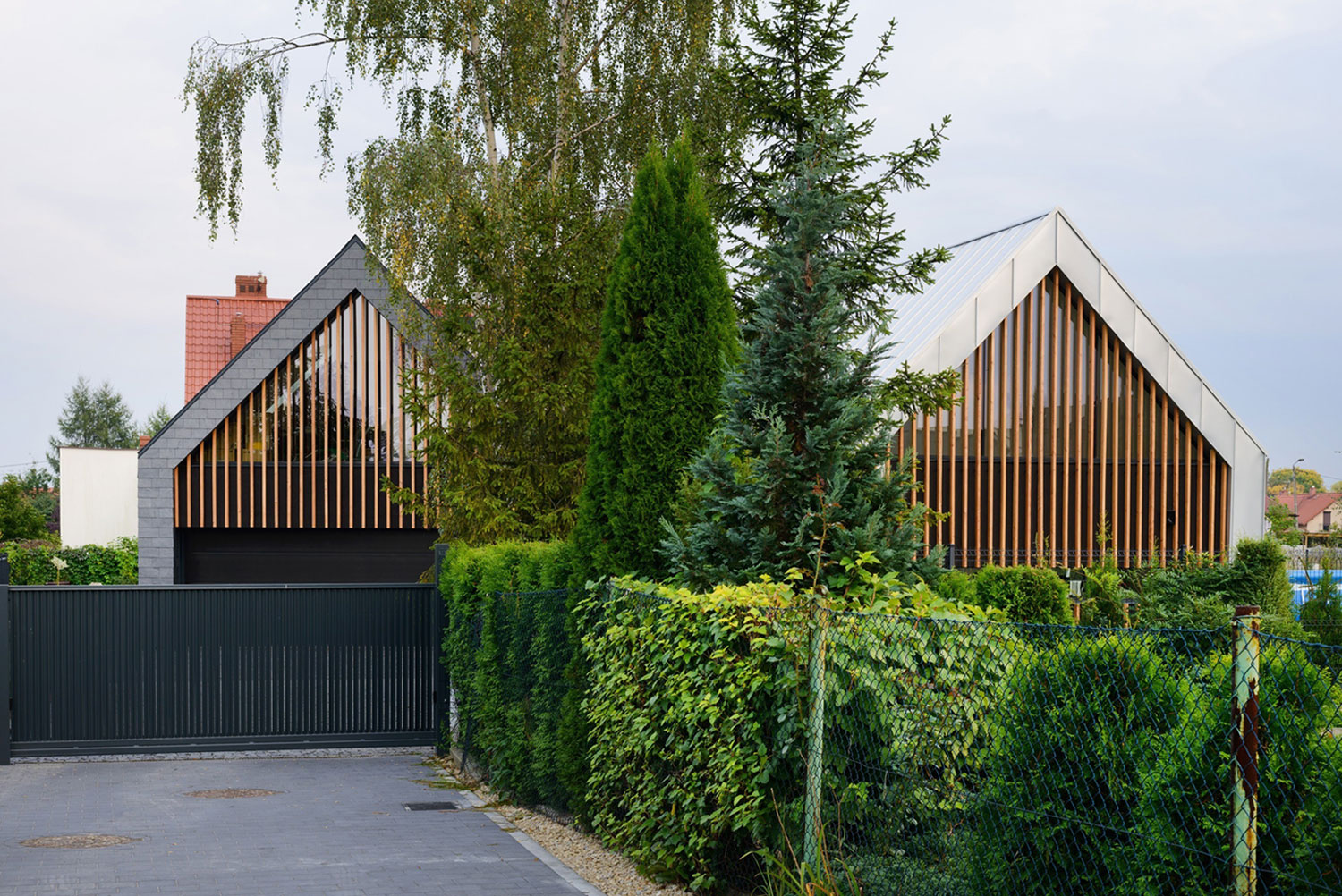 A Stunning and Spacious Two Barns House for a Modern Family in Tychy, Poland by RS + Robert Skitek (2)