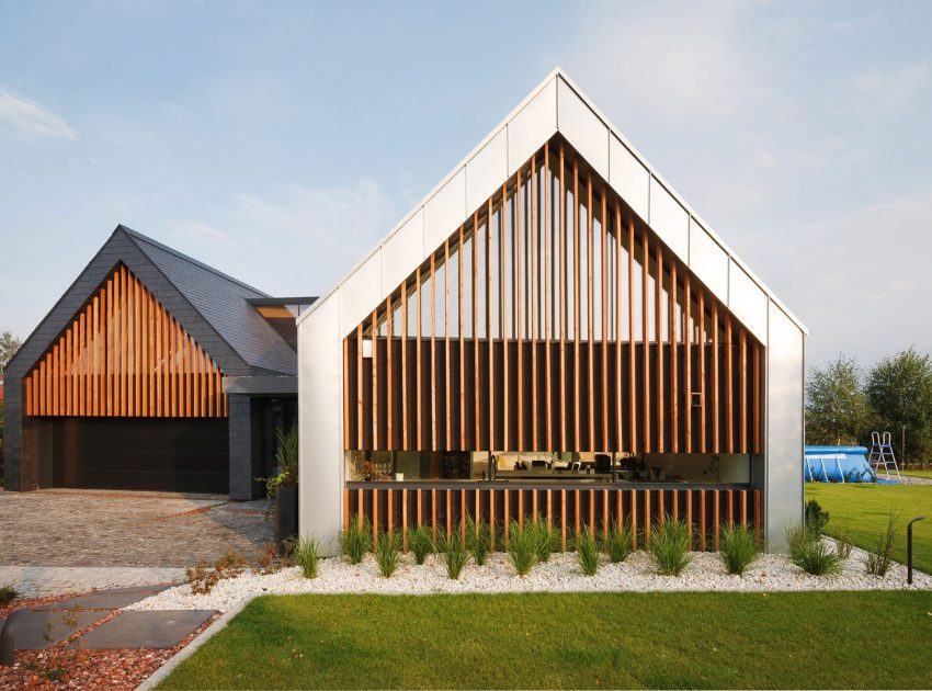 A Stunning and Spacious Two Barns House for a Modern Family in Tychy, Poland by RS + Robert Skitek (3)