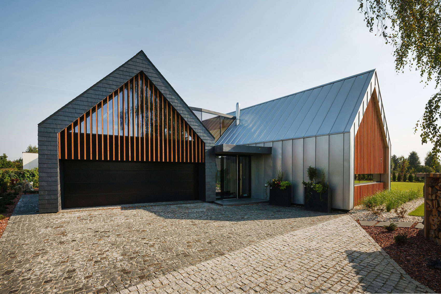 A Stunning and Spacious Two Barns House for a Modern Family in Tychy, Poland by RS + Robert Skitek (5)