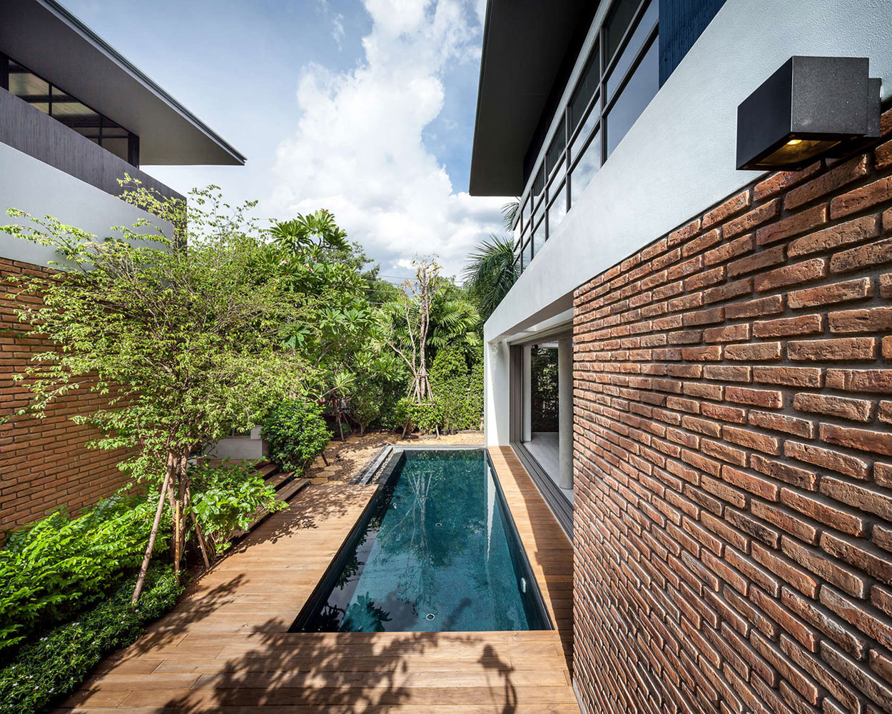 A Striking Modern Industrial House with Sophisticated Accents in Bangkok, Thailand by Alkhemist Architects (3)