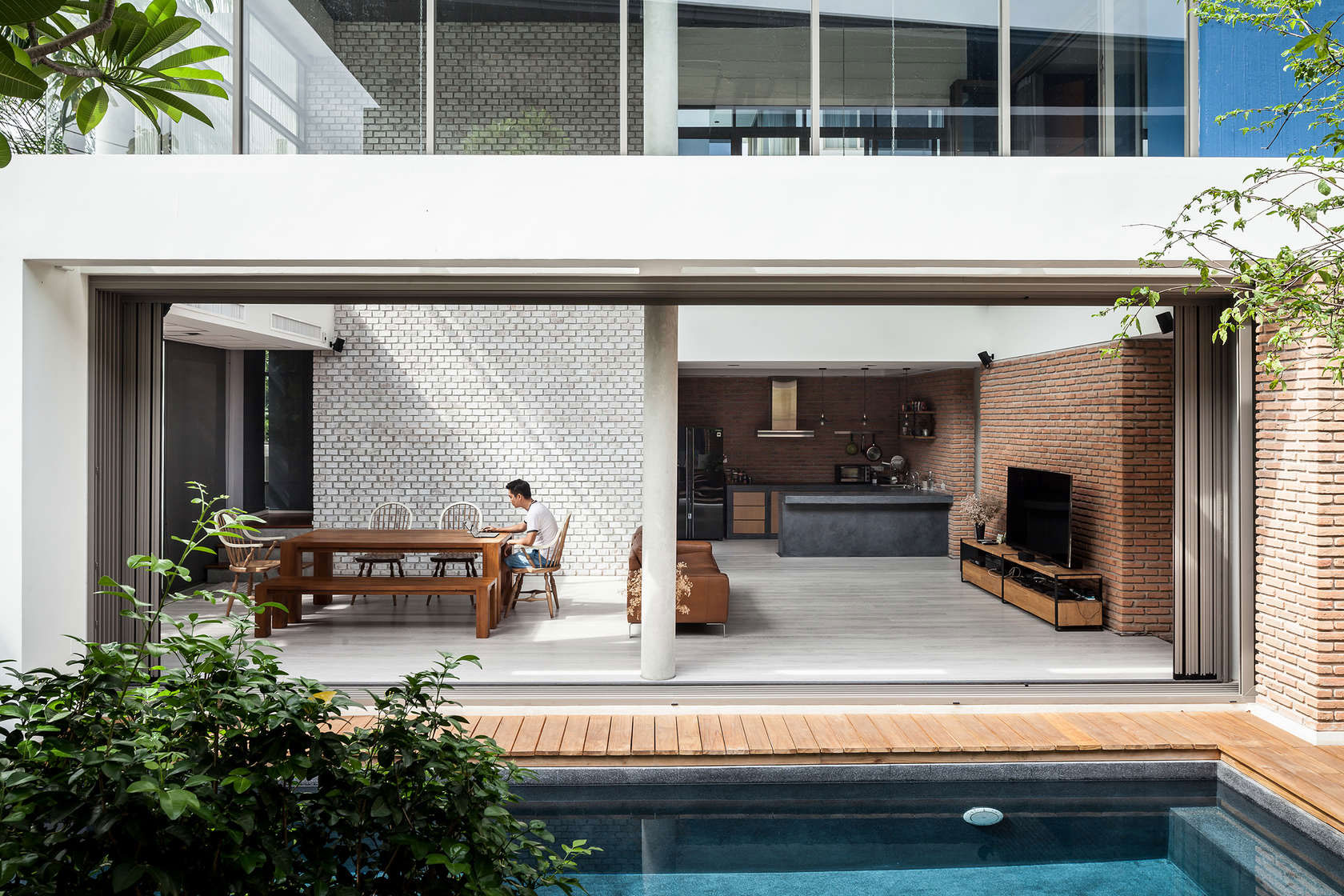 A Striking Modern Industrial House with Sophisticated Accents in Bangkok, Thailand by Alkhemist Architects (4)
