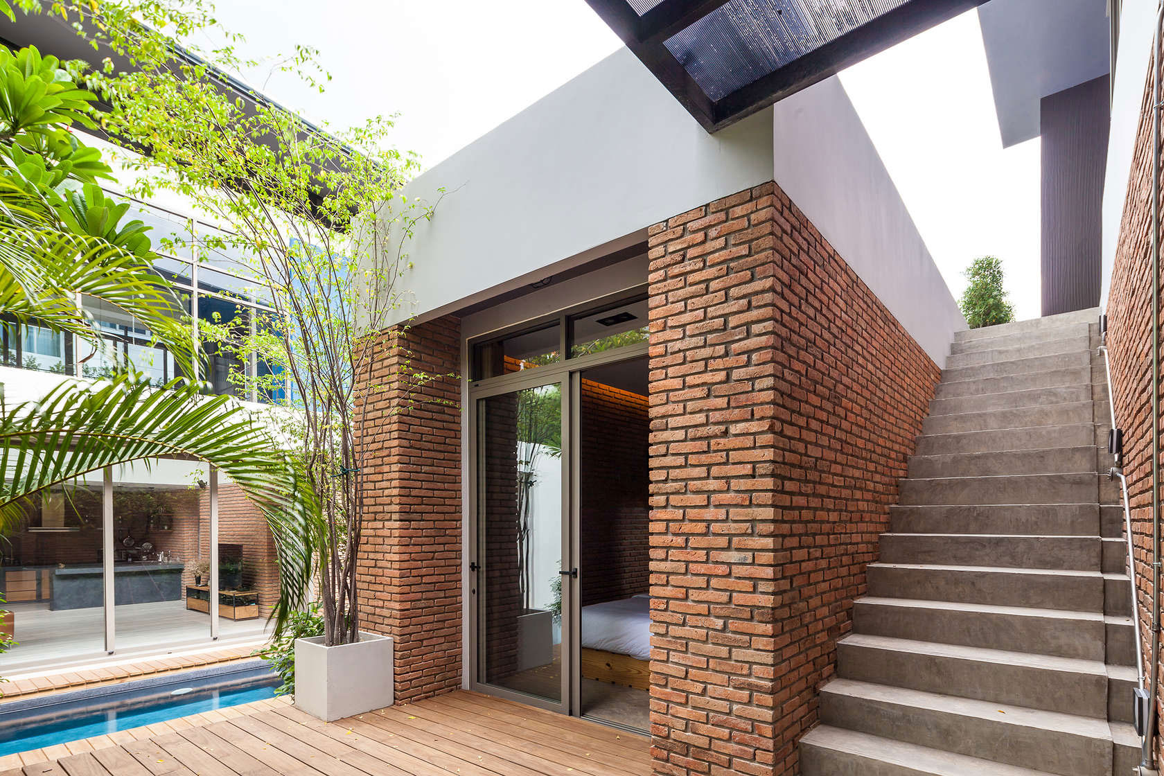 A Striking Modern Industrial House with Sophisticated Accents in Bangkok, Thailand by Alkhemist Architects (5)